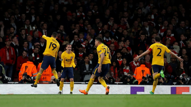 Pemain Atletico Madrid merayakan gol ke gawang Arsenal.