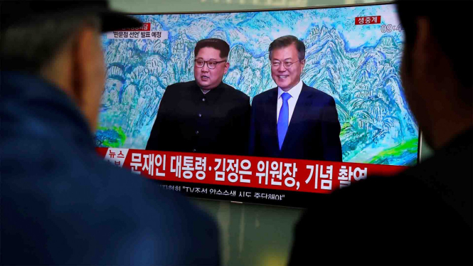 Pemimpin Korea Utara Kim Jong Un dan Presiden Korea Selatan Moon Jae In