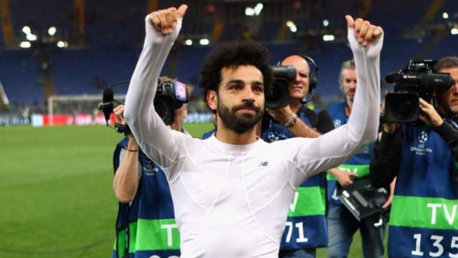 Selebrasi Mohamed Salah usai bawa Liverpool singkirkan AS Roma.