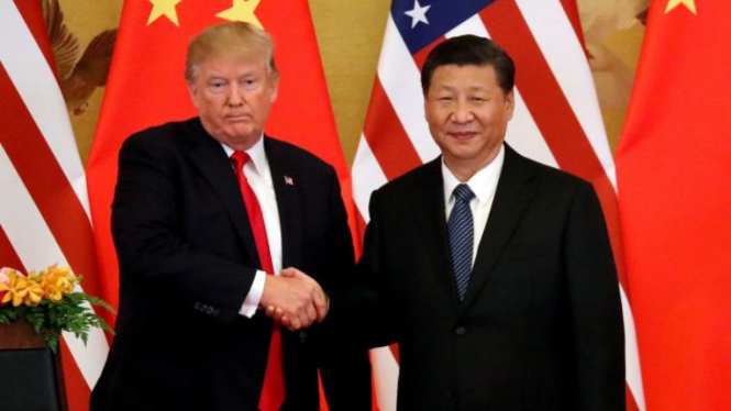Presiden AS Donald Trump dan Presiden China Xi Jinping membuat pernyataan bersama di Beijing, 9 November 2017.