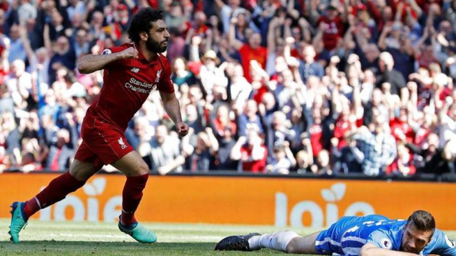 Bintang Liverpool, Mohamed Salah, melakukan selebrasi usai mencetak gol