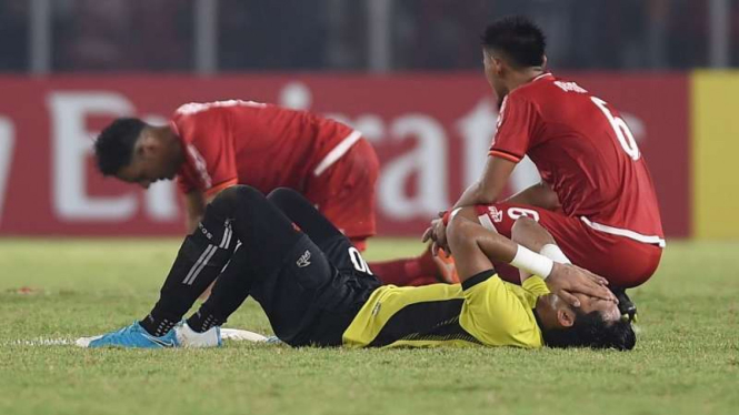 Kiper Persija Jakarta, Muhammad Rizky, usai kalah dari Home United