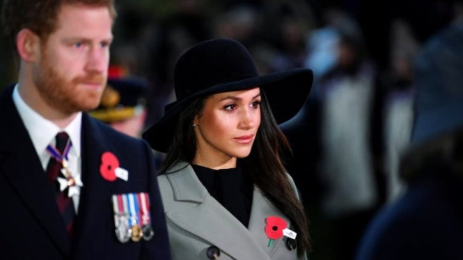 Pangeran Harry dan Meghan Markle menghadiri acara di Wellington Arch, London (25 April 2018). - Getty Images