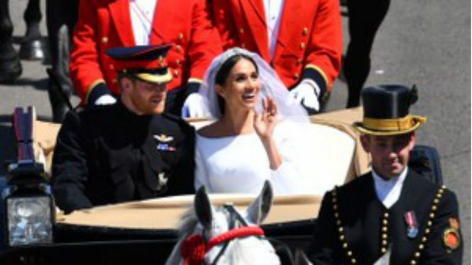 Pangeran Harry dan Meghan Markle resmi jadi suami istri