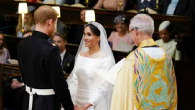 Pangeran Harry dan Meghan Markle resmi jadi suami istri