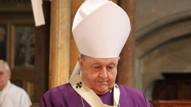 Uskup Agung Philip Wilsomak menolak mengundurkan diri namun menyatakan akan berhenti sementara.