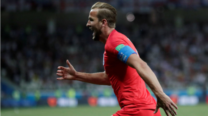 Kapten Inggris, Harry Kane, usai cetak gol ke gawang Tunisia