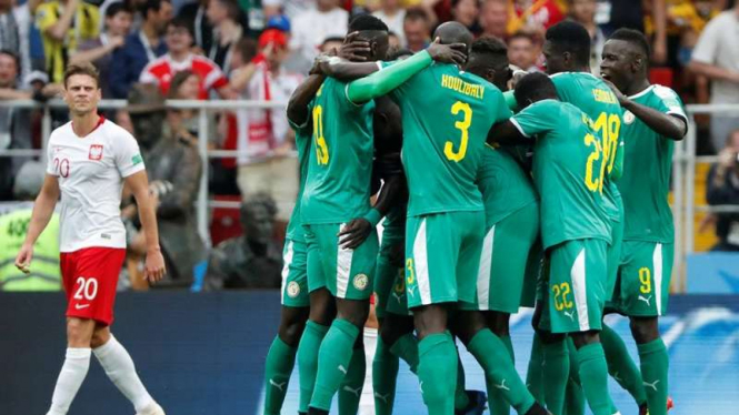 Para pemain Timnas Senegal merayakan gol