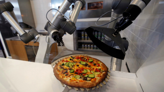 Robot pembuat pizza di Prancis.