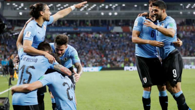 Timnas Uruguay saat merayakan gol di Piala Dunia 2018.