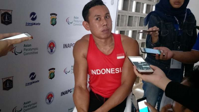 Atlet Balap Kursi Roda, Zainal Arifin.