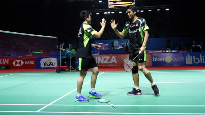 Aksi ganda campuran Tontowi Ahmad/Liliyana Natsir