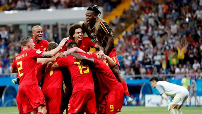 Para pemain Timnas Belgia merayakan kemenangan.