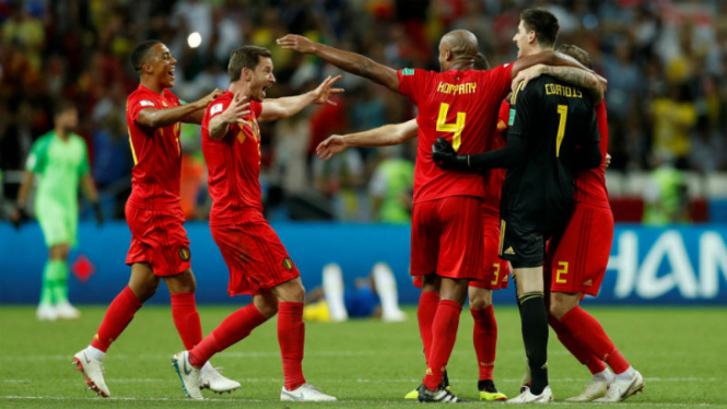Para pemain Belgia merayakan kelolosan ke semifinal Piala Dunia 2018.