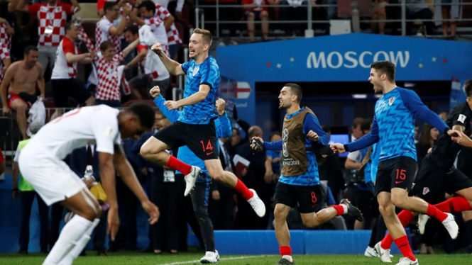 Pemain Kroasia merayakan kemenangan atas Inggris