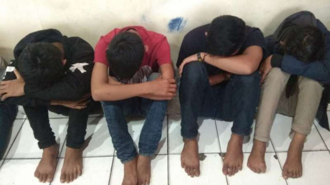 Empat oknum suporter Sriwijaya FC diamankan polisi.
