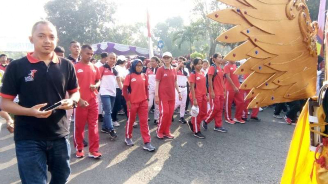 Gerak jalan sambut Asian Games 2018 di Tigaraksa, Kamis, 2 Agustus 2018.