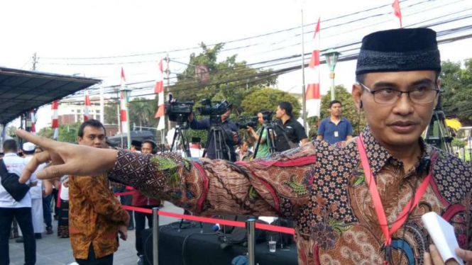 Koordinator lapangan acara arak-arakan Jokowi dan KH Maruf Amin ke KPU, Nick Marahman. 