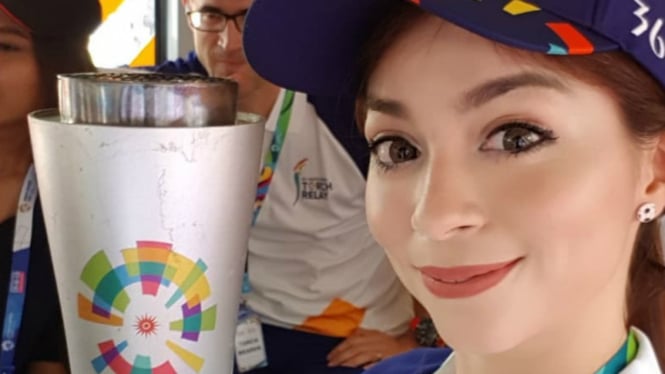 Sandra Olga ikut pawai obor Asian Games 2018.