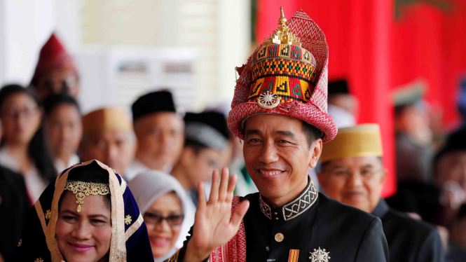 Presiden Joko Widodo mengenakan pakaian adat Aceh saat upacara HUT RI ke-73