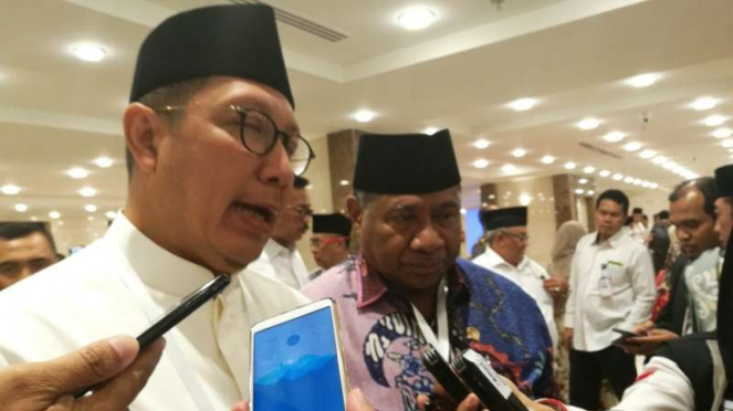 Menteri Agama Lukman Hakim Saifuddin dan Ketua Komisi VIII Ali Taher Parasong