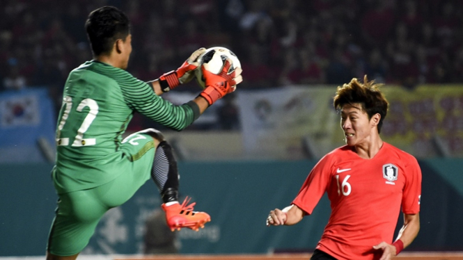 Penjaga gawang Malaysia Muhammad Haziq Nadzli (kiri) saat melawan Korea Selatan