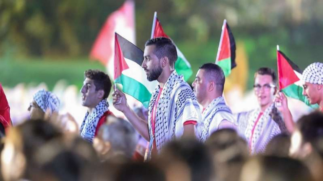 Defile des palästinensischen Kontingents bei der Eröffnung der 18. Asienspiele 2018 im GBK