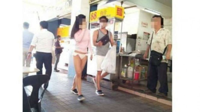 Turis hanya menggunakan celana bikini berkeliaran di Sabah bikin heboh