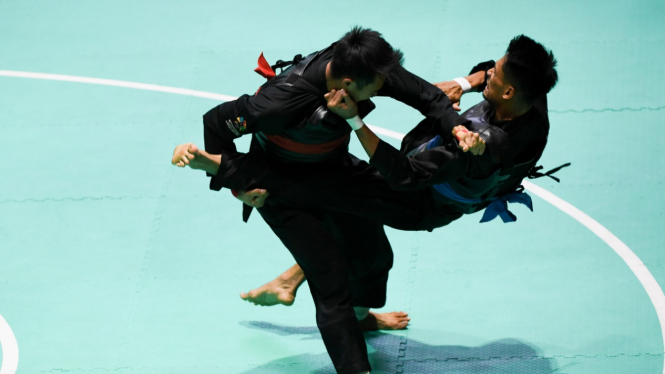 Adi Putra Komang Harik Raih Emas dari Silat  65-70kg