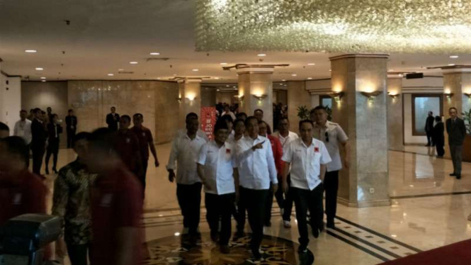 Presiden Jokowi tiba di lokasi rakernas Projo di Jakarta.