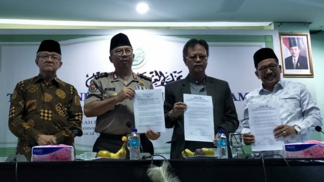 Konferensi pers Majelis Ulama Indonesia (MUI) terkait pembakaran bendera berlafal tauhid oleh Banser