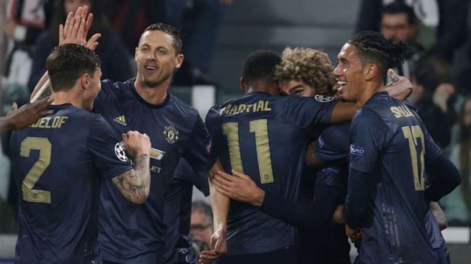 Pemain Manchester United rayakan kemenangan atas Juventus.