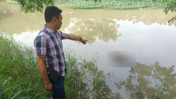 Lokasi penemuan mayat sopir transportasi online di Sungai Citarap, Pasar Kemis.