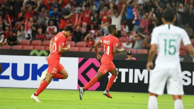 Pemain Singapura merayakan gol ke gawang Timnas Indonesia