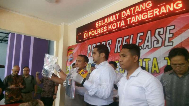 Polres Kota Tangerang merilis penangkapan kasus pembunuhan sopir Grab.