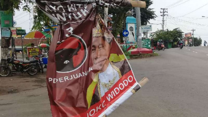 Poster 'Jokowi Raja' yang terpampang di Kota Semarang, Jawa Tengah.