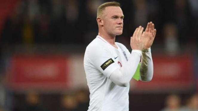 Wayne Rooney seusai menjalani pertandingan perpisahan melawan AS di Wembley.