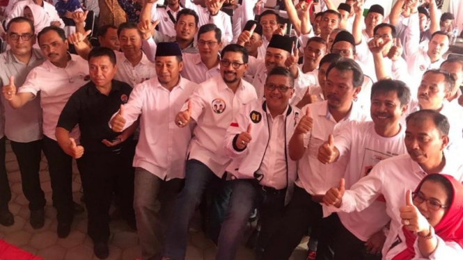 Tim Kampanye Nasional Jokowi-Ma'ruf.
