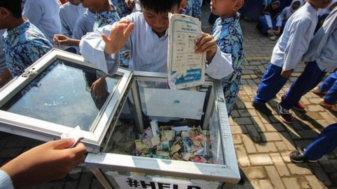 Kemenag: Kegiatan keagamaan yang tidak memiliki yayasan menerima bantuan melalui uang yang dikirim ke rekening pribadi seorang pemuka agama. - WF Sihardian/ Getty Images