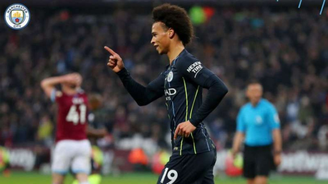 Pemain Manchester City, Leroy Sane rayakan gol.