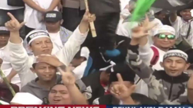 Peserta aksi Reuni 212 di Lapangan Monas, Jakarta Pusat.