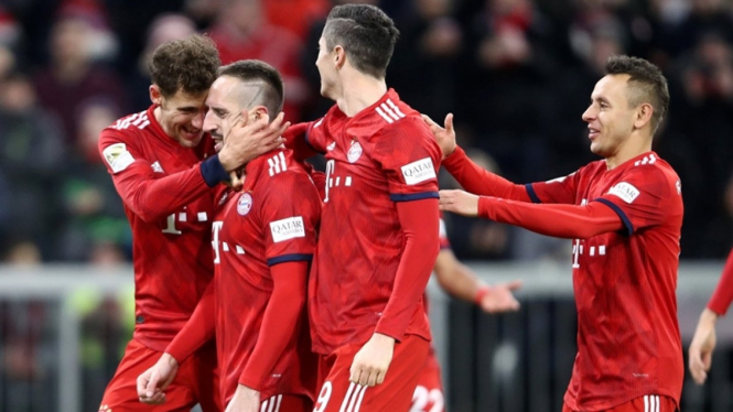 Pemain Bayern Munich merayakan gol.