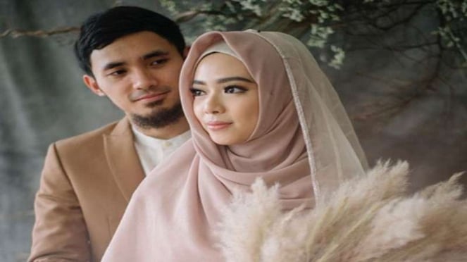 Achmad Hufi y Lindswell Quok.