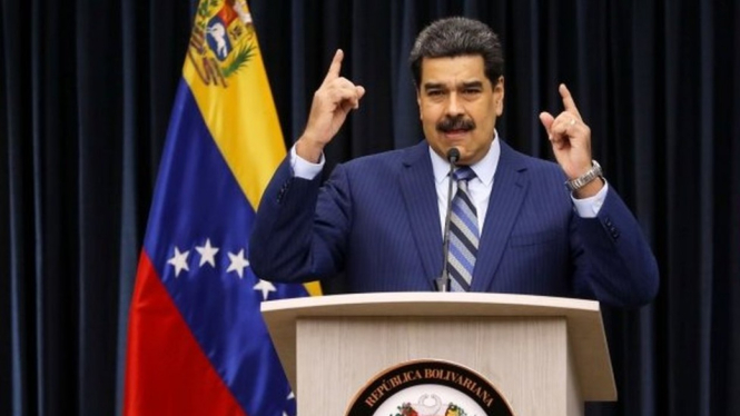 Maduro menggelar jumpa pers di Istana Miraflores, Caracas, Rabu (12/12). - EPA