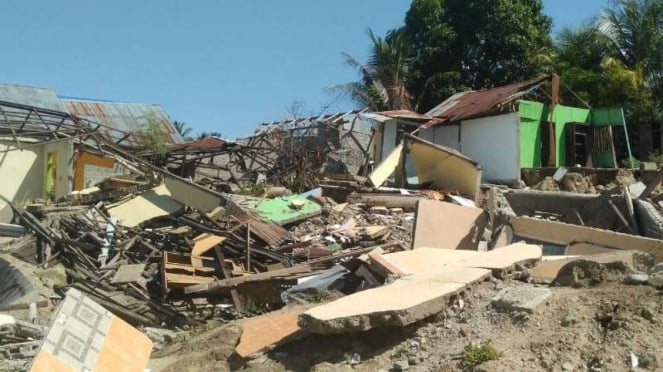 Rumah-rumah rusak akibat likuifaksi di Kelurahan Petobo, Kecamatan Palu Selatan.