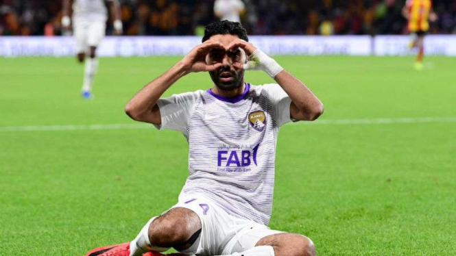 Pemain Al Ain rayakan gol.