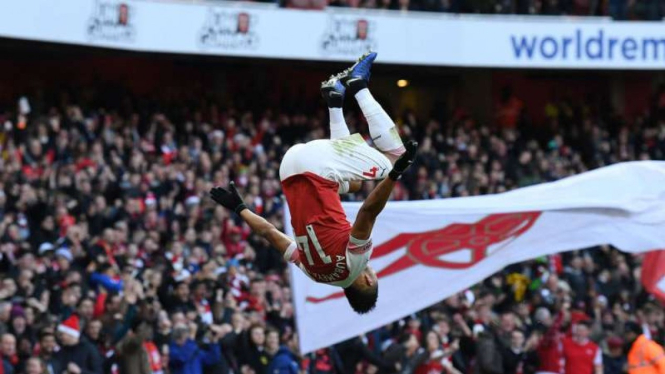 Striker Arsenal, Pierre-Emerick Aubameyang rayakan gol.