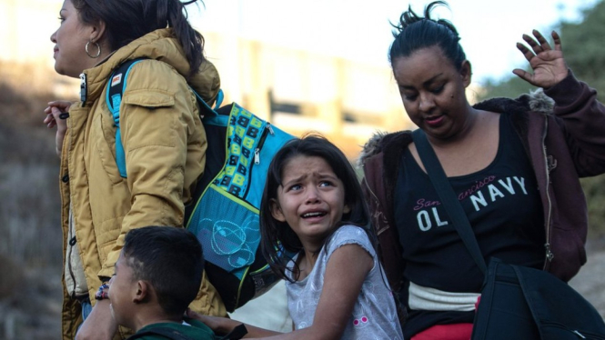 Para imigran yang tiba di perbatasan AS-Meksiko mengatakan mereka melarikan diri dari negaranya untuk menghindari persekusi, kemiskinan, dan kekerasan - Getty Images