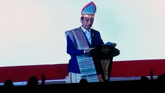 Presiden Joko Widodo dalam Perayaan Natal Nasional di Gedung Serba Guna Tengku Rizal Noordin di Kabupaten Deli Serdang, Sumatera Utara, Sabtu malam, 30 Desember 2018.