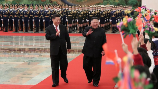Kim Jong-un bertemu Xi Jinping di Beijing.-AFP